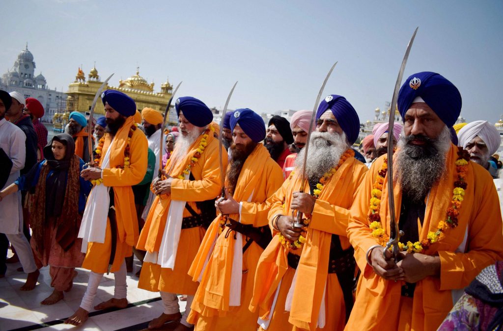 Why orange color is used in Sikhism