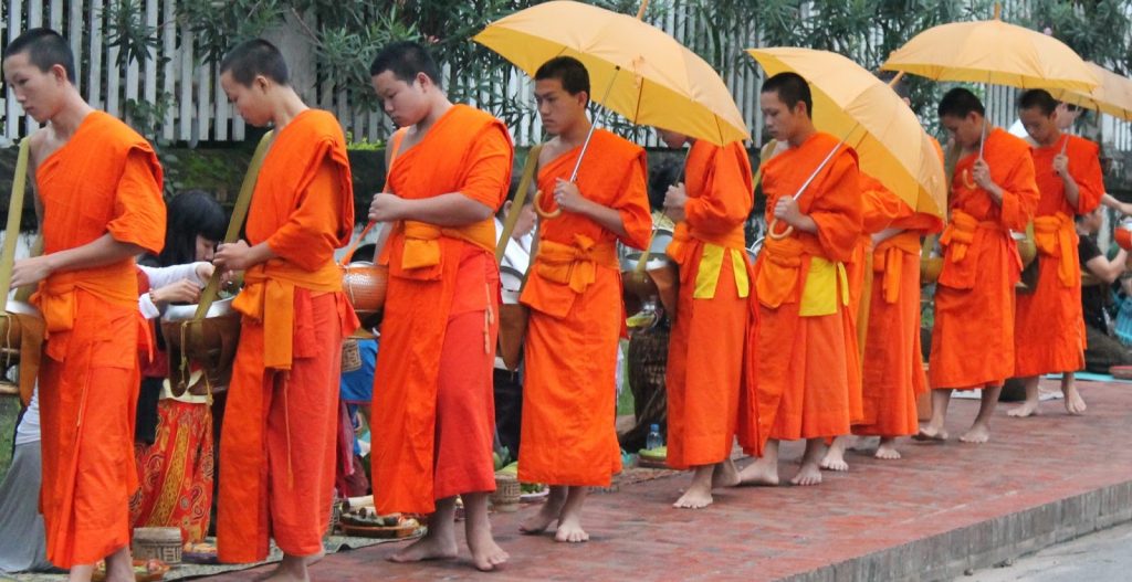 Why orange color is used in buddhism